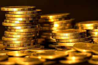The Glittering Tale: Unveiling the Illustrious History of Gold as Money